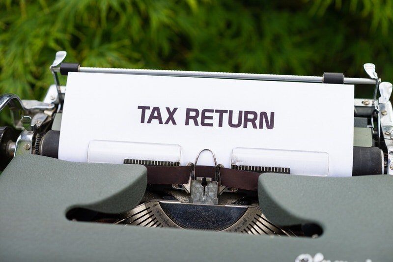 Researching latest tax rules and regulations.